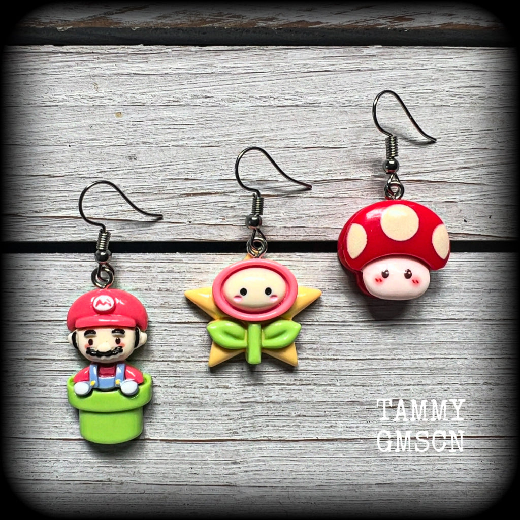 This is a super cute 3pc mix and match set of Mario Bros earrings featuring classic Mario brothers we all know and love, measuring between 4 and 5cms from tip to tip, and weighing only a few grams each.

This 3pcs mix and match set have been made with stainless steel french hooks, to be worn in pierced ears.