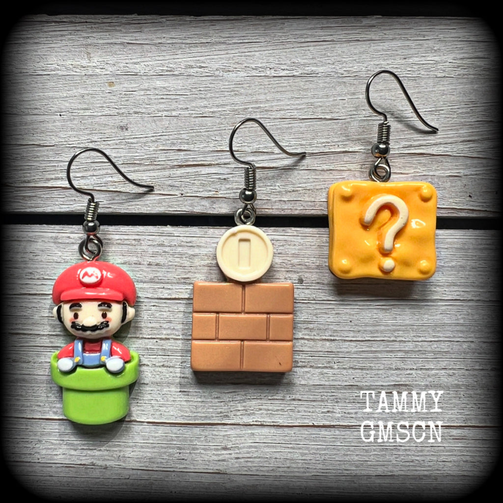 This is a super cute 3pc mix and match set of Mario Bros earrings featuring classic Mario brothers we all know and love, measuring between 4 and 5cms from tip to tip, and weighing only a few grams each.

This 3pcs mix and match set have been made with stainless steel french hooks, to be worn in pierced ears