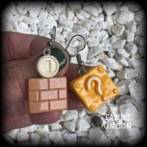 This is a super cute 3pc mix and match set of Mario Bros earrings featuring classic Mario brothers we all know and love, measuring between 4 and 5cms from tip to tip, and weighing only a few grams each.

This 3pcs mix and match set have been made with stainless steel french hooks, to be worn in pierced ears