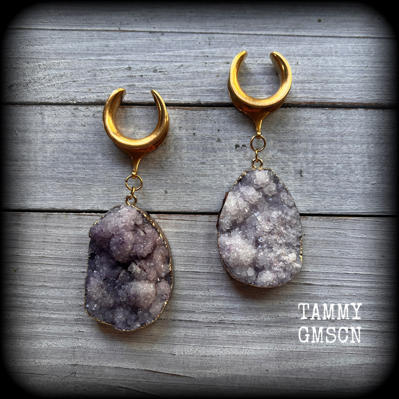 This is a pair of gorgeous dusty purple druzy ear hangers featuring real druzy gems in an antique gold setting.

Measuring just 7.5 cms from tip to tip, and weighing approx 25 & 35 grams each, these gorgeous rustic earrings are big, beautiful, unique and absolutely fabulous!!

This pair has been made on 3/4” gauge (19mm) titanium coated surgical steel cradles, for stretched lobes.