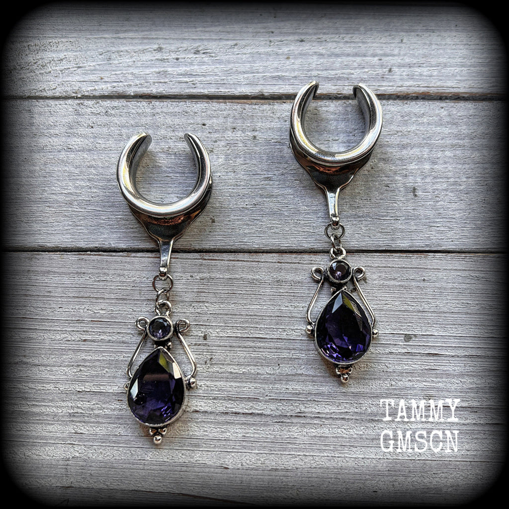 These gorgeous gauged earrings feature beautiful purple facet amethyst gemstones in an antique silver boho setting, measuring just over 7cms from tip to tip, and weighing approx 9 grams each, not too heavy...

This pair have been made on 3/4” gauge (19mm) surgical steel cradles-suitable for stretched lobes.