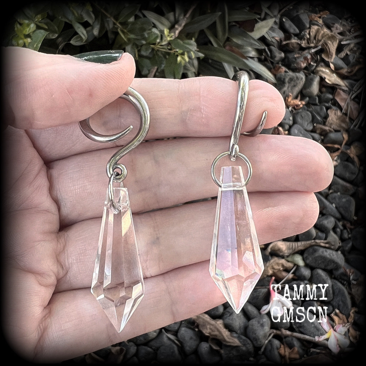 These gorgeous dangly glass earrings have been made with gorgeous faceted faux glass spears, measuring 6.5 cms from tip to tip, and weighing approx 8 grams each.

These earrings have been made on 6 gauge (4mm) surgical steel full curls, to be worn in stretched lobes.