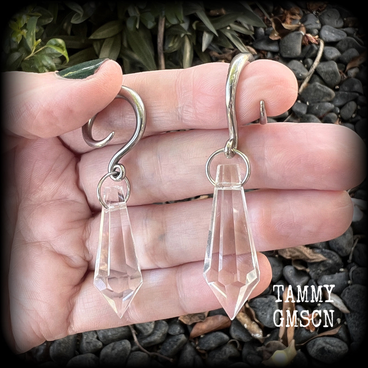 These gorgeous dangly glass earrings have been made with gorgeous faceted faux glass spears, measuring 6.5 cms from tip to tip, and weighing approx 8 grams each.

These earrings have been made on 6 gauge (4mm) surgical steel full curls, to be worn in stretched lobes.