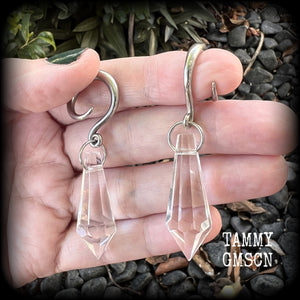 These gorgeous dangly glass earrings have been made with gorgeous faceted faux glass spears, measuring 6.5 cms from tip to tip, and weighing approx 8 grams each.

These earrings have been made on 6 gauge (4mm) surgical steel full curls, to be worn in stretched lobes.