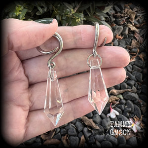 These gorgeous dangly glass earrings have been made with gorgeous faceted faux glass spears, measuring 6.5 cms from tip to tip, and weighing approx 8 grams each.

These earrings have been made on 6 gauge (4mm) surgical steel full curls, to be worn in stretched lobes.