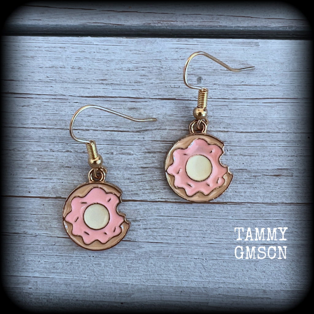 This pair of adorable antique gold and enamel iced doughnut earrings measures just on 3.5cms from tip to tip, and are super light weight at only a few grams each.

This pair has been made with french hooks, suitable for pierced ears.