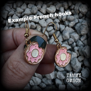 This pair of adorable antique gold and enamel iced doughnut earrings measures just on 3.5cms from tip to tip, and are super light weight at only a few grams each.

This pair has been made with french hooks, suitable for pierced ears.