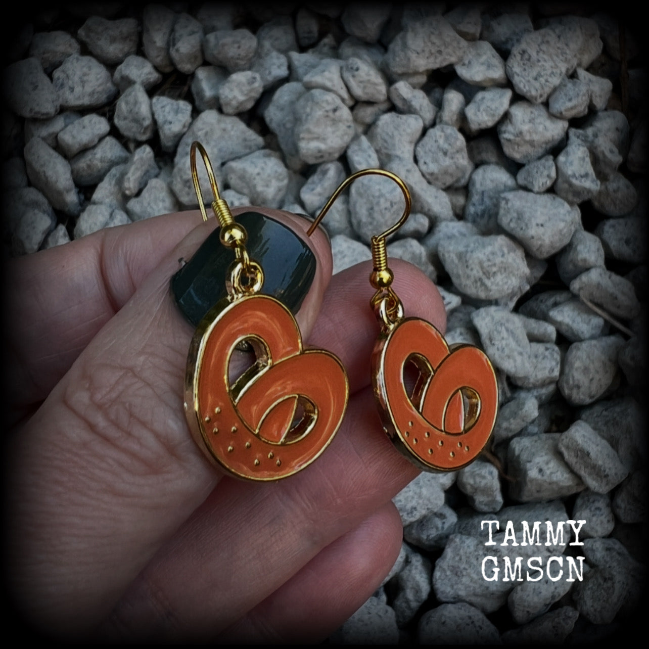 This pair of antique gold and enamel pretzel earrings measures just over 4cms from tip to tip, and are super light weight at only a few grams each.

This pair have been made with french hooks, suitable for both pierced ears.