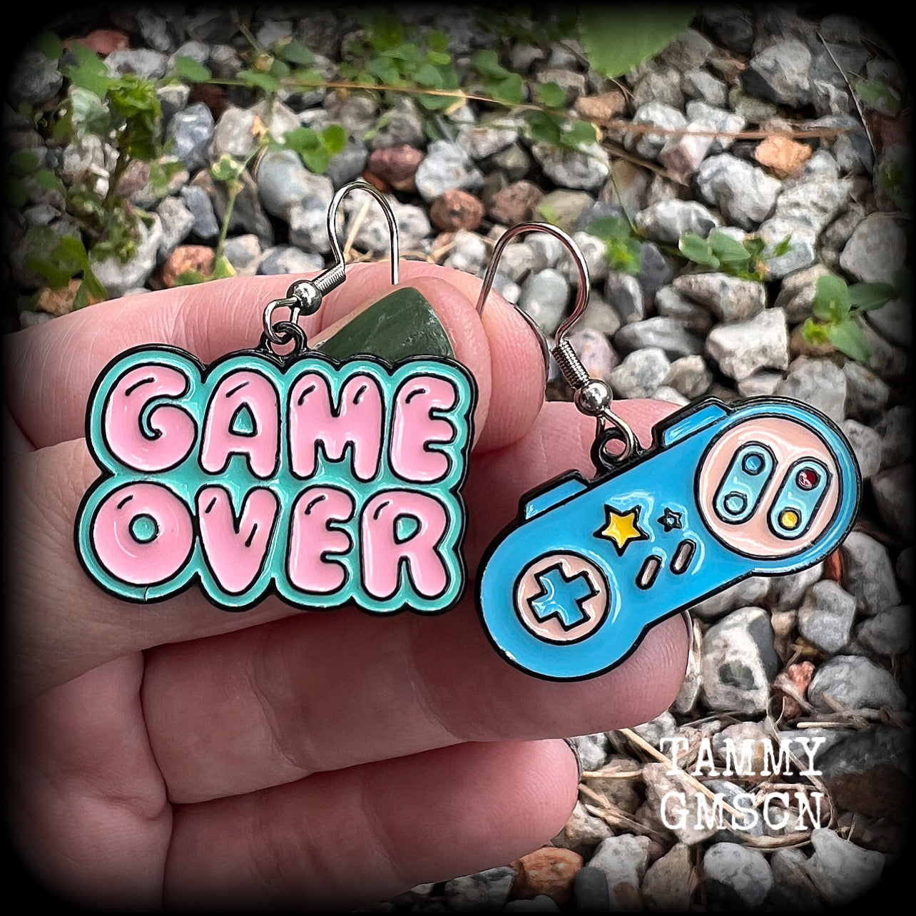 This pair of super cute ‘Game over’ gamer girl earrings measure approx 4cms from tip to tip, and weigh only a few grams each, lovely and lightweight and not too dangly.
This pair has been made with stainless steel french hooks, for pierced ears.