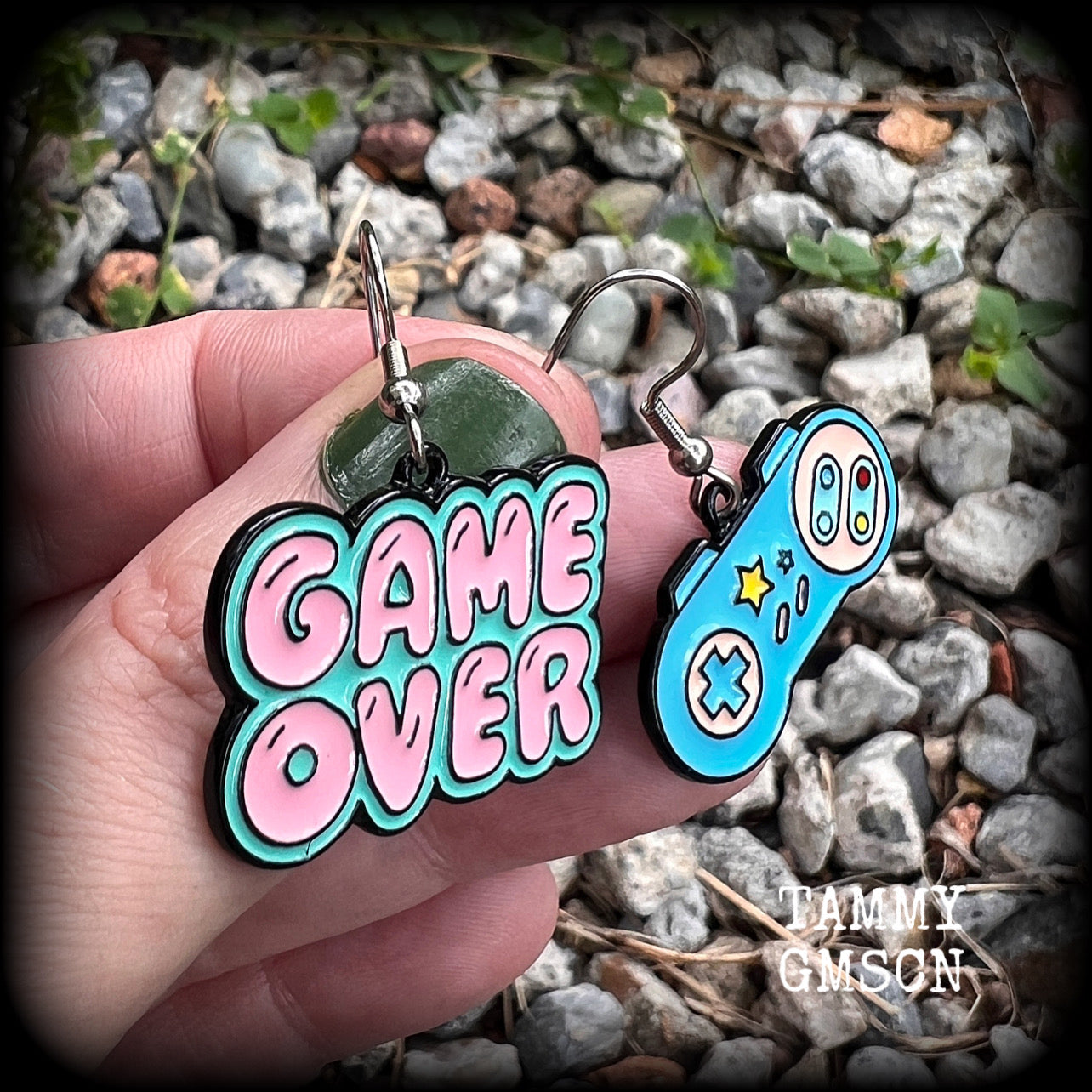 This pair of super cute ‘Game over’ gamer girl earrings measure approx 4cms from tip to tip, and weigh only a few grams each, lovely and lightweight and not too dangly.
This pair has been made with stainless steel french hooks, for pierced ears.