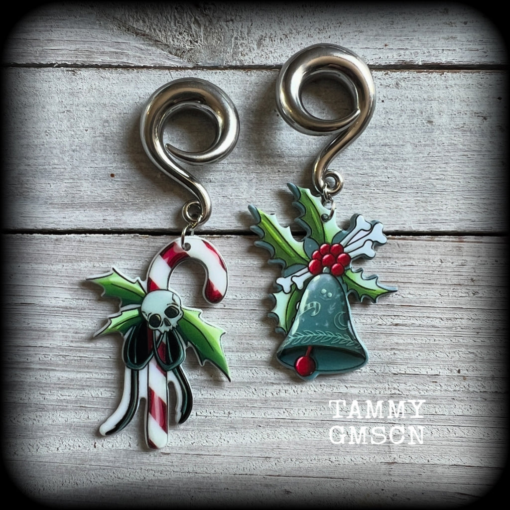 Featuring awesome acrylic candy cane skull and boney Christmas holly and bell charms, these earrings weigh approx 16 grams each, and are lovely and dangly at just under 9cms from tip to tip.

This pair has been made on 0 gauge (8mm) surgical steel full curl hooks, to be worn in stretched lobes.