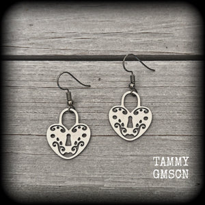 This pair of earrings feature a pretty in punk stainless steel heart padlock, measuring just on 4cms from tip to tip, weighing only a grams or two each.

This pair has been made on stainless steel french hooks, suitable for pierced ears.
