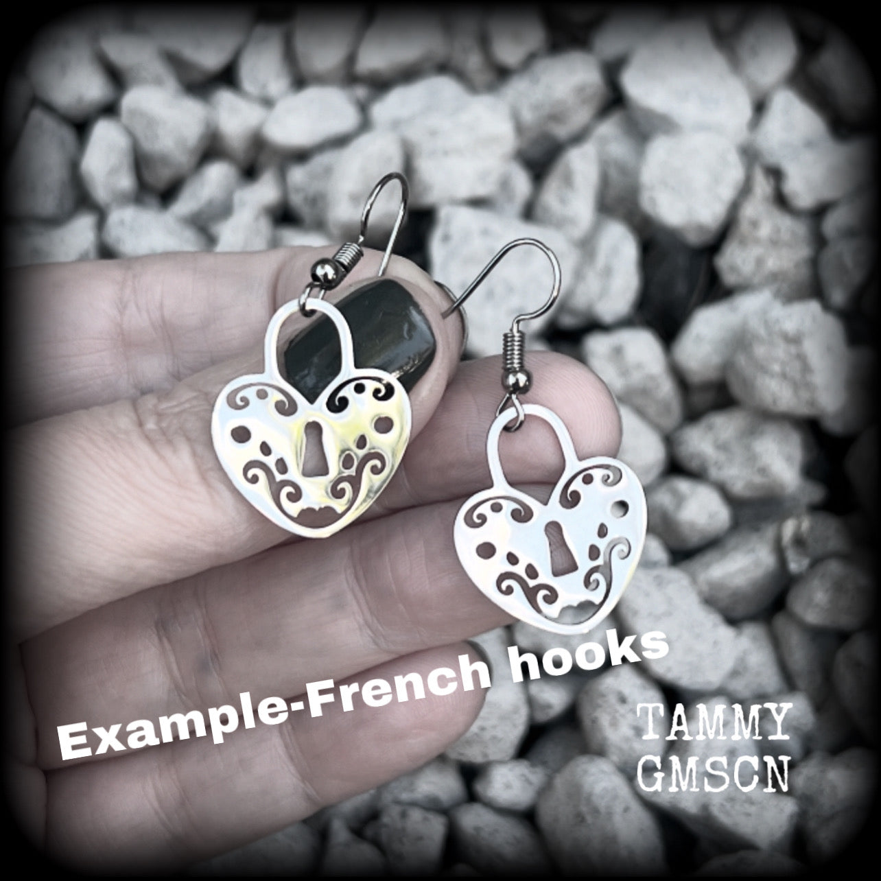 This pair of earrings feature a pretty in punk stainless steel heart padlock, measuring just on 4cms from tip to tip, weighing only a grams or two each.

This pair has been made on stainless steel french hooks, suitable for pierced ears.
