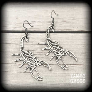 These earrings feature a gorgeous stainless steel desert scorpion, measuring 7cms from tip to tip, and super lightweight at only a few grams each.

This pair have been made with stainless steel french hooks, suitable for pierced ears.
