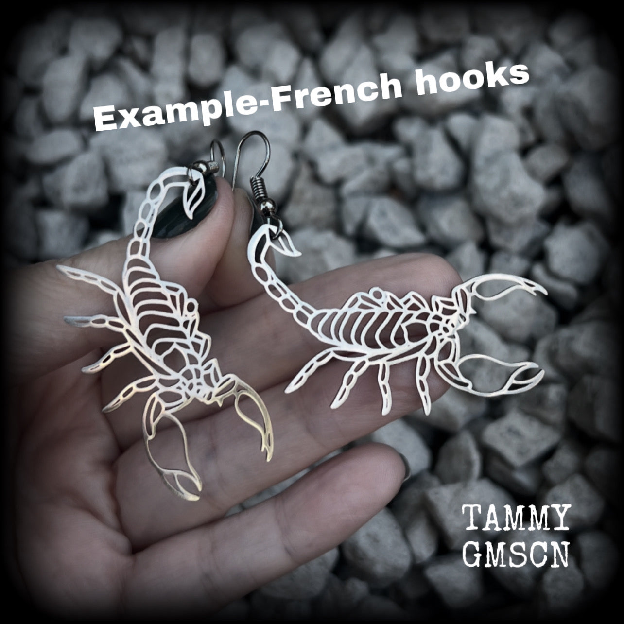 These earrings feature a gorgeous stainless steel desert scorpion, measuring 7cms from tip to tip, and super lightweight at only a few grams each.

This pair have been made with stainless steel french hooks, suitable for pierced ears.

