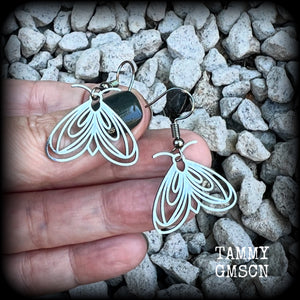 These earrings feature a beautiful stainless steel moth, measuring just under 4cms from tip to tip, and super lightweight at only a few grams each.

This pair have been made with stainless steel french hooks, suitable for pierced ears.