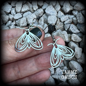 These earrings feature a beautiful stainless steel moth, measuring just under 4cms from tip to tip, and super lightweight at only a few grams each.

This pair have been made with stainless steel french hooks, suitable for pierced ears.