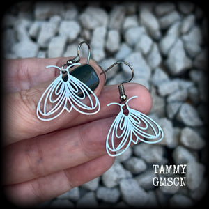 These earrings feature a beautiful stainless steel moth, measuring just under 4cms from tip to tip, and super lightweight at only a few grams each.

This pair have been made with stainless steel french hooks, suitable for pierced ears.