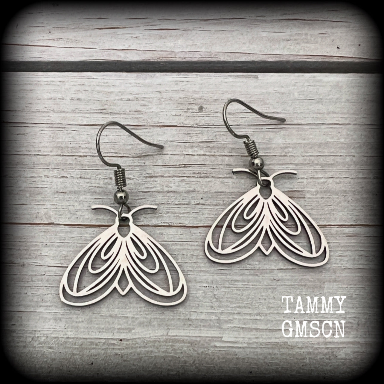 These earrings feature a beautiful stainless steel moth, measuring just under 4cms from tip to tip, and super lightweight at only a few grams each.

This pair have been made with stainless steel french hooks, suitable for pierced ears.