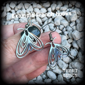 These earrings feature a beautiful stainless steel moth, measuring just under 4cms from tip to tip, and super lightweight at only a few grams each.

This pair have been made with stainless steel french hooks, suitable for pierced ears.