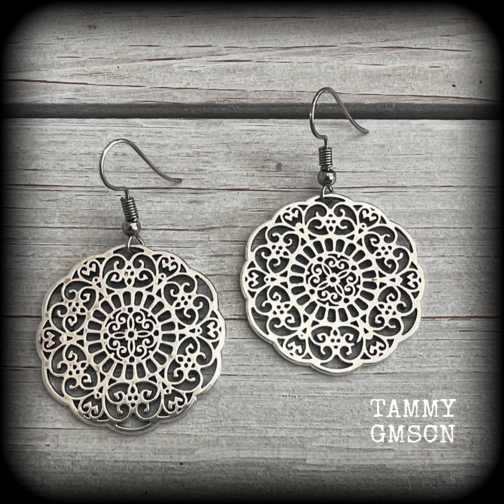 These earrings feature gorgeous antique silver mandalas, measuring just over 5cms from tip to tip, and weighing only 5 grams each.  This pair has been made with stainless steel french hooks, for pierced ears.