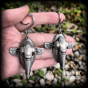 Featuring big beautiful Boba Fett Slave One spaceships, these gauged earrings weigh approx 40 grams each and measure just under 9cms from tip to tip, a must have for any Star Wars fan!

This pair has been made on 6 gauge (4mm) surgical steel full curls, to be worn in stretched lobes.