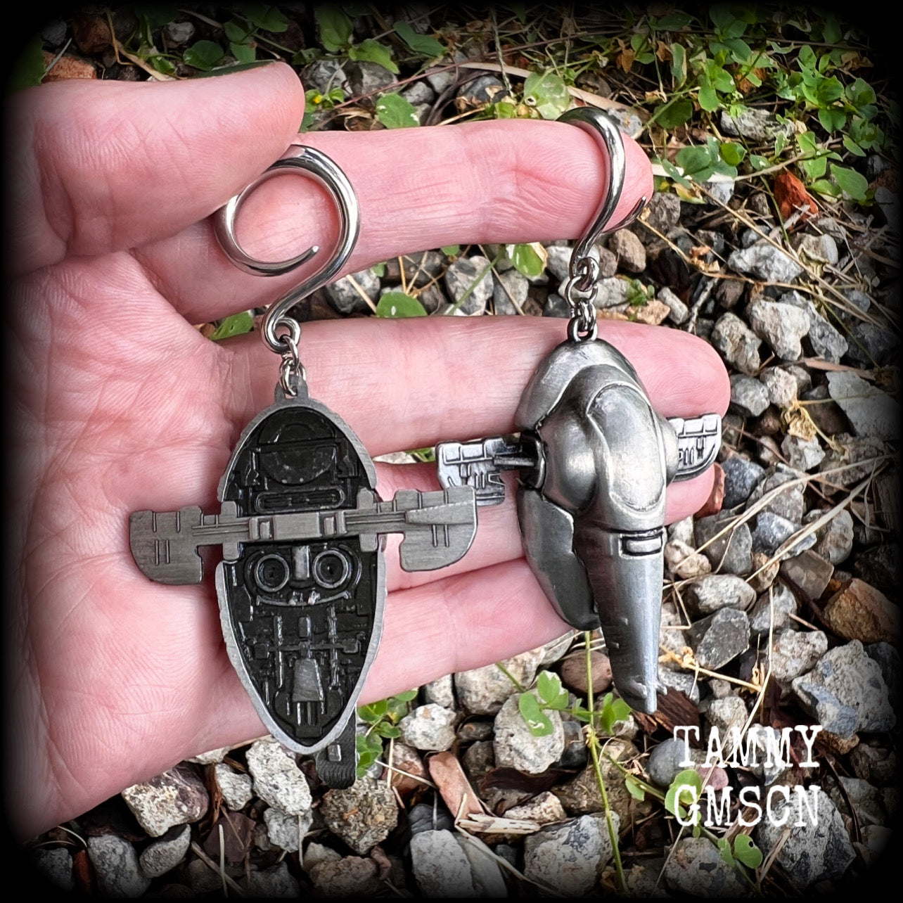 Featuring big beautiful Boba Fett Slave One spaceships, these gauged earrings weigh approx 40 grams each and measure just under 9cms from tip to tip, a must have for any Star Wars fan!

This pair has been made on 6 gauge (4mm) surgical steel full curls, to be worn in stretched lobes.