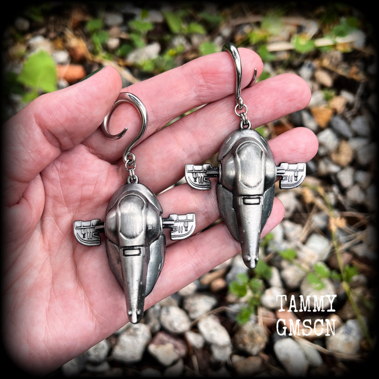 Featuring big beautiful Boba Fett Slave One spaceships, these gauged earrings weigh approx 40 grams each and measure just under 9cms from tip to tip, a must have for any Star Wars fan!

This pair has been made on 6 gauge (4mm) surgical steel full curls, to be worn in stretched lobes.