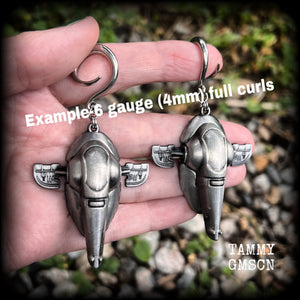 Featuring big beautiful Boba Fett Slave One spaceships, these gauged earrings weigh approx 40 grams each and measure just under 9cms from tip to tip, a must have for any Star Wars fan!

This pair has been made on 6 gauge (4mm) surgical steel full curls, to be worn in stretched lobes.