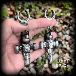 Featuring big beautiful Firefly Serenity vessel spaceships, these gauged earrings weigh approx 45 grams each and measure just over 9cms from tip to tip, a must have for any Firefly fan!

This pair has been made on 5/8” gauge (16mm) surgical steel cradles, to be worn in stretched lobes.