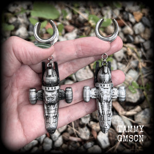 Featuring big beautiful Firefly Serenity vessel spaceships, these gauged earrings weigh approx 45 grams each and measure just over 9cms from tip to tip, a must have for any Firefly fan!

This pair has been made on 5/8” gauge (16mm) surgical steel cradles, to be worn in stretched lobes.