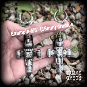 Featuring big beautiful Firefly Serenity vessel spaceships, these gauged earrings weigh approx 45 grams each and measure just over 9cms from tip to tip, a must have for any Firefly fan!

This pair has been made on 5/8” gauge (16mm) surgical steel cradles, to be worn in stretched lobes.