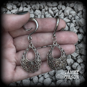 These beautiful ornate ear hangers feature antique silver filigree teardrop mandalas, inspired by Aphrodite, the Greek Goddess of love and beauty. These earrings nice and light weight, weighing approx 6 grams a piece and measure just on 6.5cms from tip to tip.  This pair has been made on 6 gauge (4mm) surgical steel full curl hooks, suitable for stretched lobes.