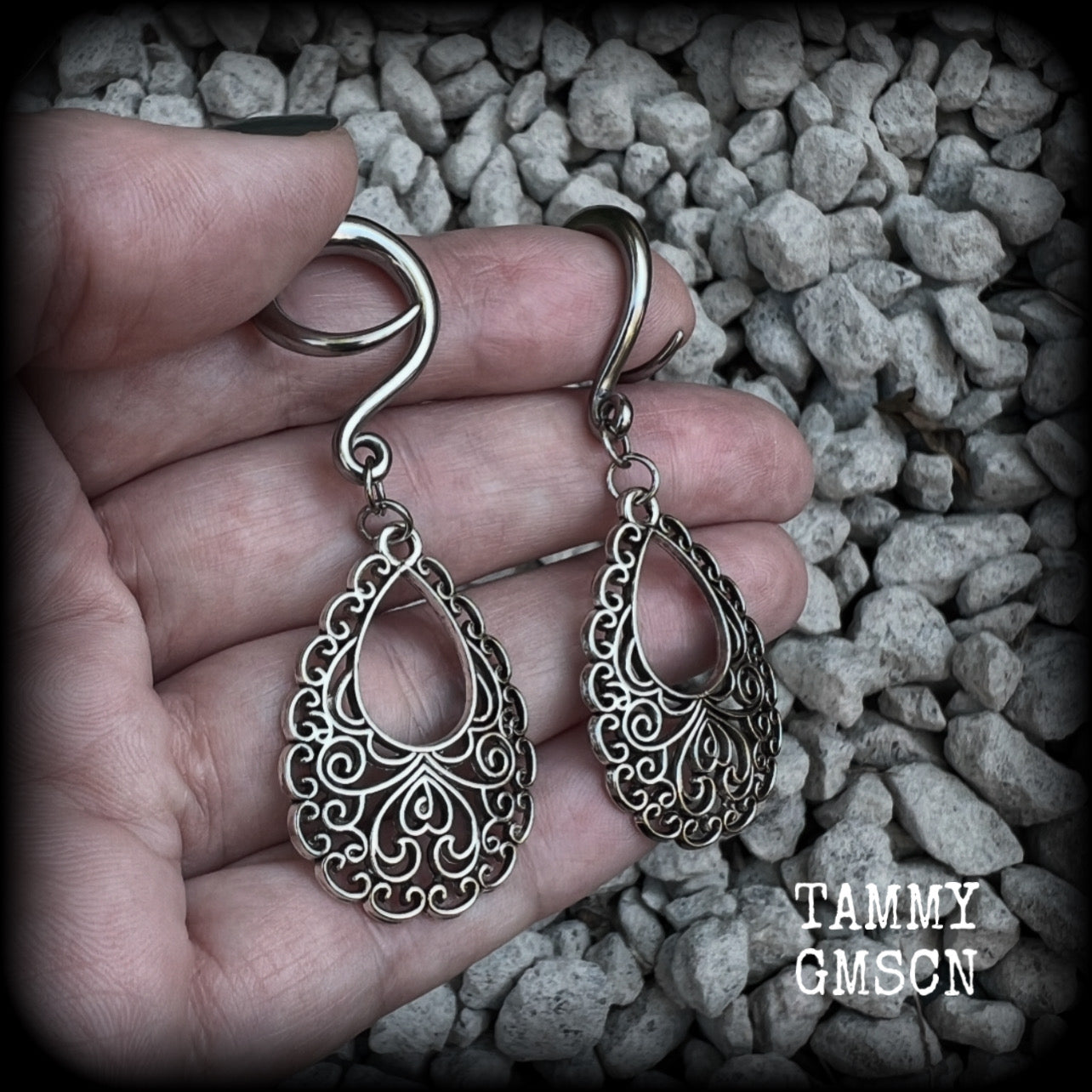 These beautiful ornate ear hangers feature antique silver filigree teardrop mandalas, inspired by Aphrodite, the Greek Goddess of love and beauty. These earrings nice and light weight, weighing approx 6 grams a piece and measure just on 6.5cms from tip to tip.  This pair has been made on 6 gauge (4mm) surgical steel full curl hooks, suitable for stretched lobes.