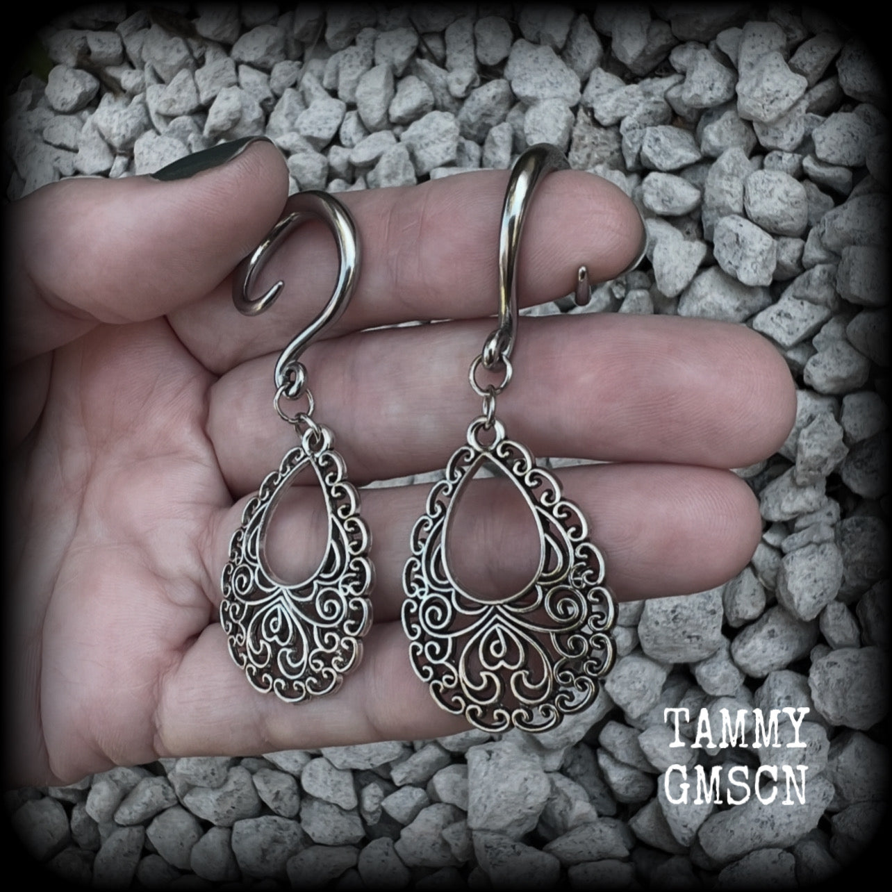 These beautiful ornate ear hangers feature antique silver filigree teardrop mandalas, inspired by Aphrodite, the Greek Goddess of love and beauty. These earrings nice and light weight, weighing approx 6 grams a piece and measure just on 6.5cms from tip to tip.  This pair has been made on 6 gauge (4mm) surgical steel full curl hooks, suitable for stretched lobes.