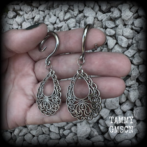 These beautiful ornate ear hangers feature antique silver filigree teardrop mandalas, inspired by Aphrodite, the Greek Goddess of love and beauty. These earrings nice and light weight, weighing approx 6 grams a piece and measure just on 6.5cms from tip to tip.  This pair has been made on 6 gauge (4mm) surgical steel full curl hooks, suitable for stretched lobes.