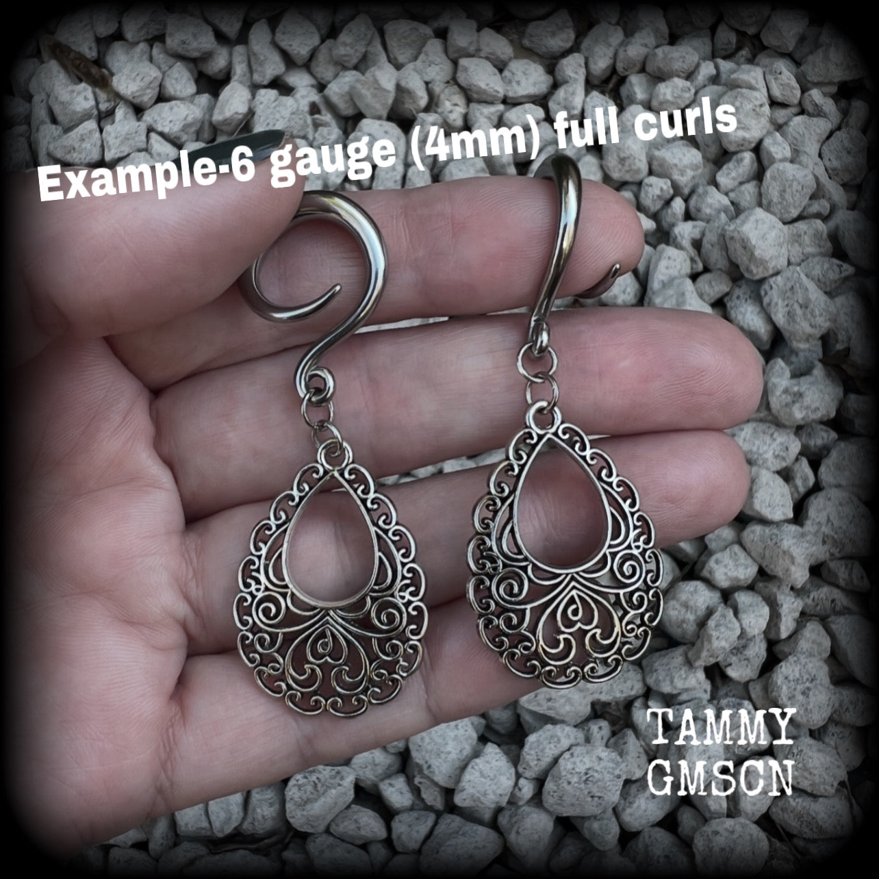 These beautiful ornate ear hangers feature antique silver filigree teardrop mandalas, inspired by Aphrodite, the Greek Goddess of love and beauty. These earrings nice and light weight, weighing approx 6 grams a piece and measure just on 6.5cms from tip to tip.  This pair has been made on 6 gauge (4mm) surgical steel full curl hooks, suitable for stretched lobes.
