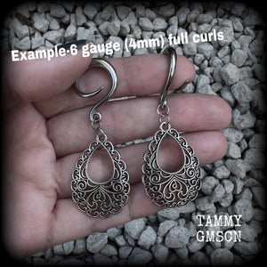 These beautiful ornate ear hangers feature antique silver filigree teardrop mandalas, inspired by Aphrodite, the Greek Goddess of love and beauty. These earrings nice and light weight, weighing approx 6 grams a piece and measure just on 6.5cms from tip to tip.  This pair has been made on 6 gauge (4mm) surgical steel full curl hooks, suitable for stretched lobes.