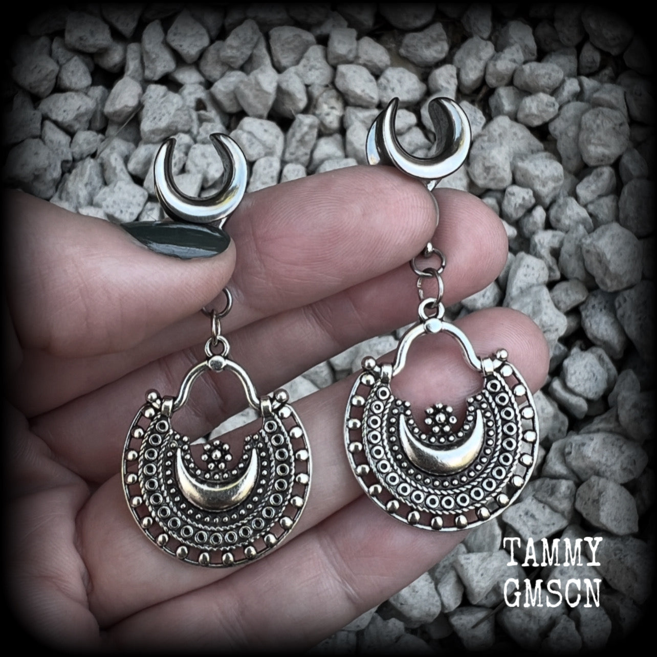 Inspired by Ishtar, Mesopotamian Goddess of love, beauty, sex and war, these beautiful ear hangers feature gorgeous boho antique silver crescent moons.  This is a lightweight pair of earrings at approx 5 grams each, and measuring just over 5.5cms from tip to tip.  This pair has been made on 00 gauge (10mm) surgical steel cradles, to be worn in stretched lobes.