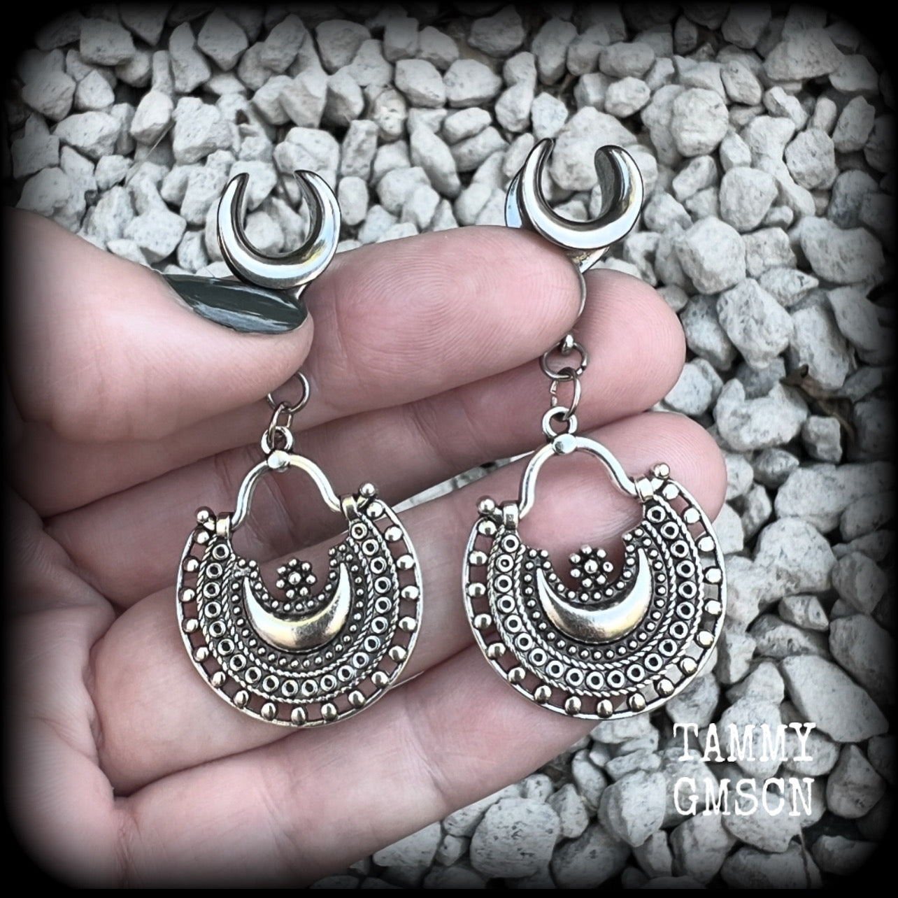 Inspired by Ishtar, Mesopotamian Goddess of love, beauty, sex and war, these beautiful ear hangers feature gorgeous boho antique silver crescent moons.  This is a lightweight pair of earrings at approx 5 grams each, and measuring just over 5.5cms from tip to tip.  This pair has been made on 00 gauge (10mm) surgical steel cradles, to be worn in stretched lobes.