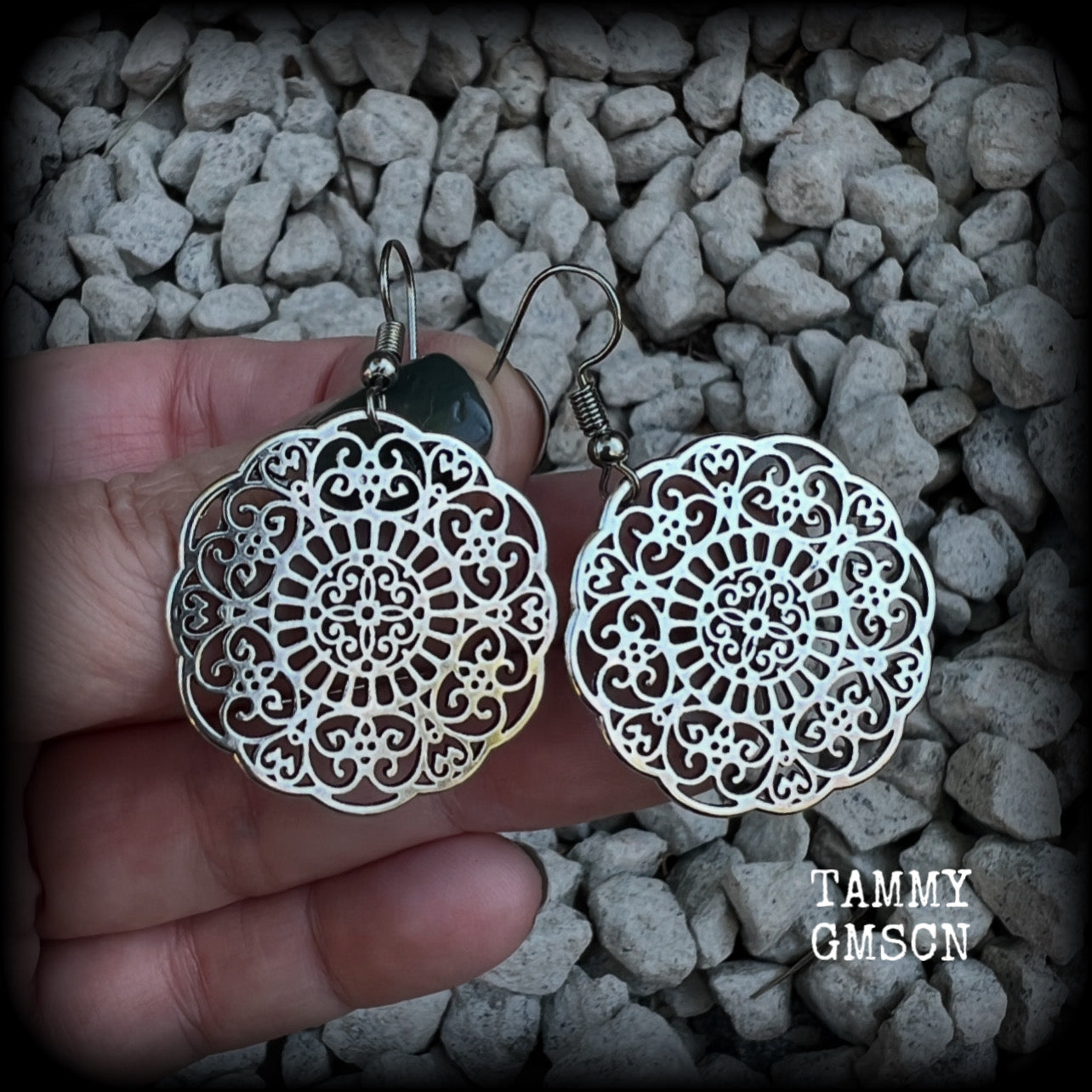 These earrings feature gorgeous antique silver mandalas, measuring just over 5cms from tip to tip, and weighing only 5 grams each.  This pair has been made with stainless steel french hooks, for pierced ears.