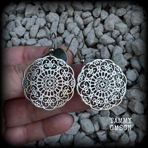These earrings feature gorgeous antique silver mandalas, measuring just over 5cms from tip to tip, and weighing only 5 grams each.  This pair has been made with stainless steel french hooks, for pierced ears.