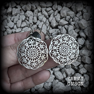 These earrings feature gorgeous antique silver mandalas, measuring just over 5cms from tip to tip, and weighing only 5 grams each.  This pair has been made with stainless steel french hooks, for pierced ears.
