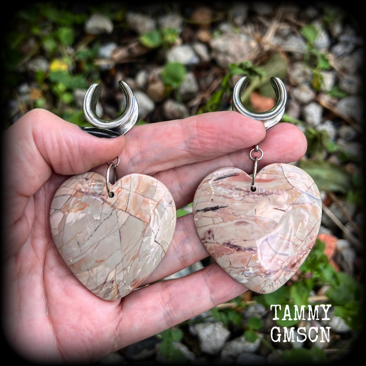 This is a pair of one-of-a-kind beautiful big Picture jasper heart gauged earrings, measuring just under 8cms from tip to tip, and weighing approx 25 grams each.
These earrings have been made on 3/4” gauge (19mm) surgical steel cradles.