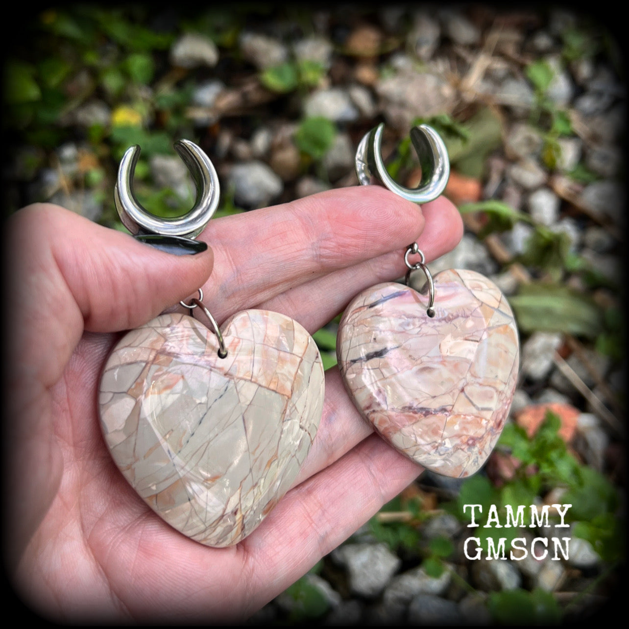 This is a pair of one-of-a-kind beautiful big Picture jasper heart gauged earrings, measuring just under 8cms from tip to tip, and weighing approx 25 grams each.
These earrings have been made on 3/4” gauge (19mm) surgical steel cradles.