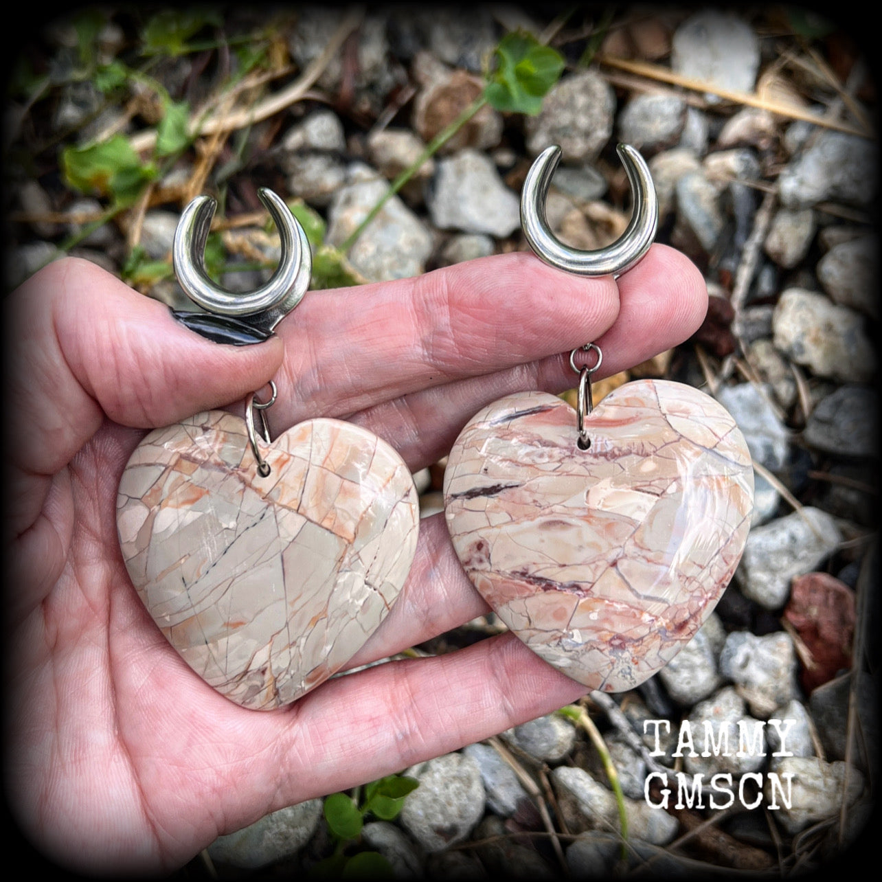 This is a pair of one-of-a-kind beautiful big Picture jasper heart gauged earrings, measuring just under 8cms from tip to tip, and weighing approx 25 grams each.
These earrings have been made on 3/4” gauge (19mm) surgical steel cradles.