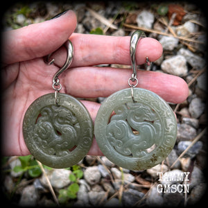 These earrings have Lantian jade pendants featuring the beautiful mythological dragons.
This pair weighs approx 35 grams a piece and measure just over 8cms from tip to tip, made on 2 gauge (6mm) surgical steel full curl hooks, for stretched lobes.