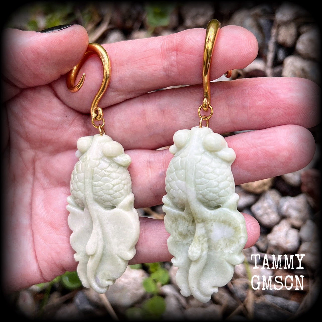 These gorgeous earrings feature carved jade koi fish, weighing approx. 20 grams each and measuring approx 9cms from tip to tip.
This pair have been made on 6 gauge (4mm) surgical steel full curls, suitable for stretched lobes.
