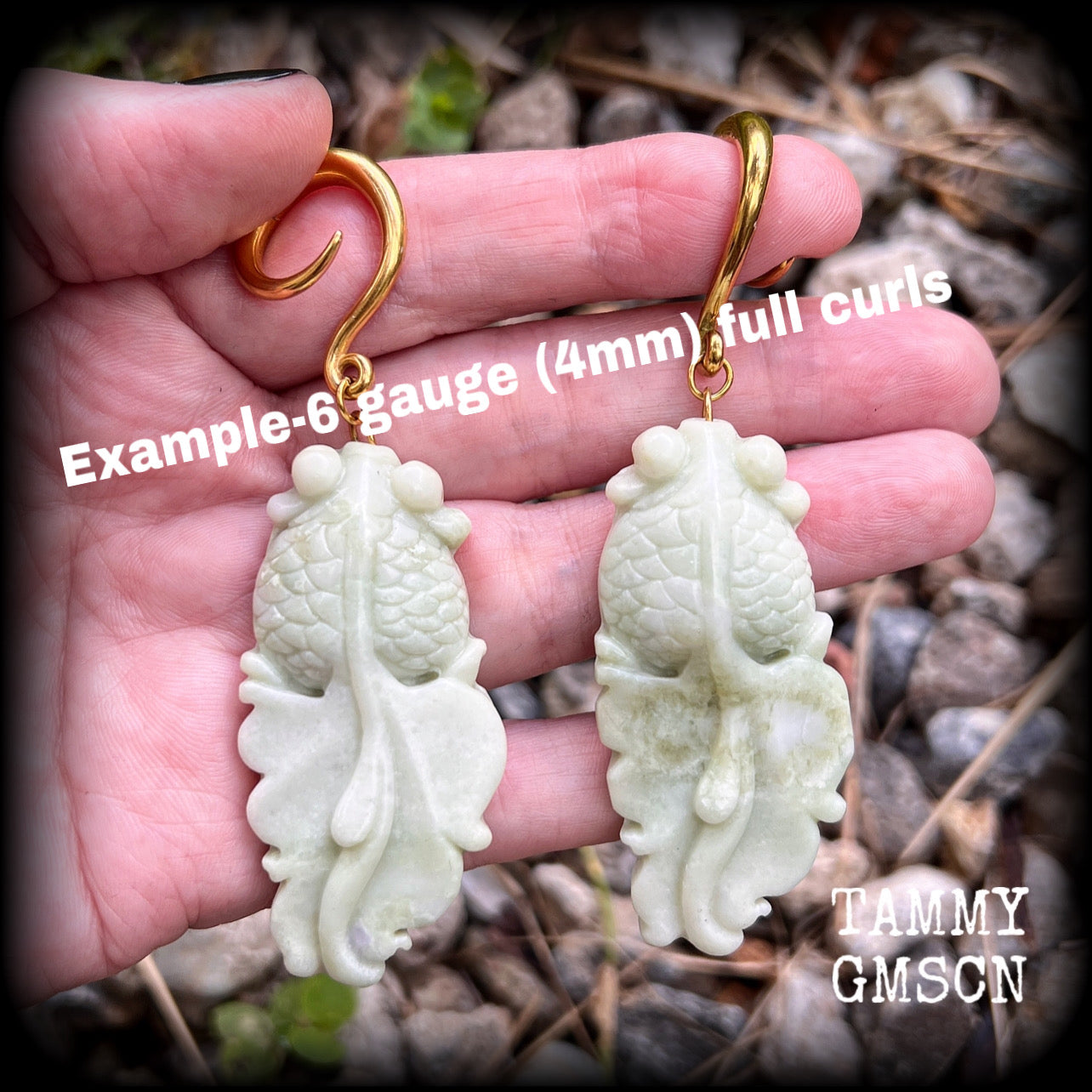 These gorgeous earrings feature carved jade koi fish, weighing approx. 20 grams each and measuring approx 9cms from tip to tip.
This pair have been made on 6 gauge (4mm) surgical steel full curls, suitable for stretched lobes.