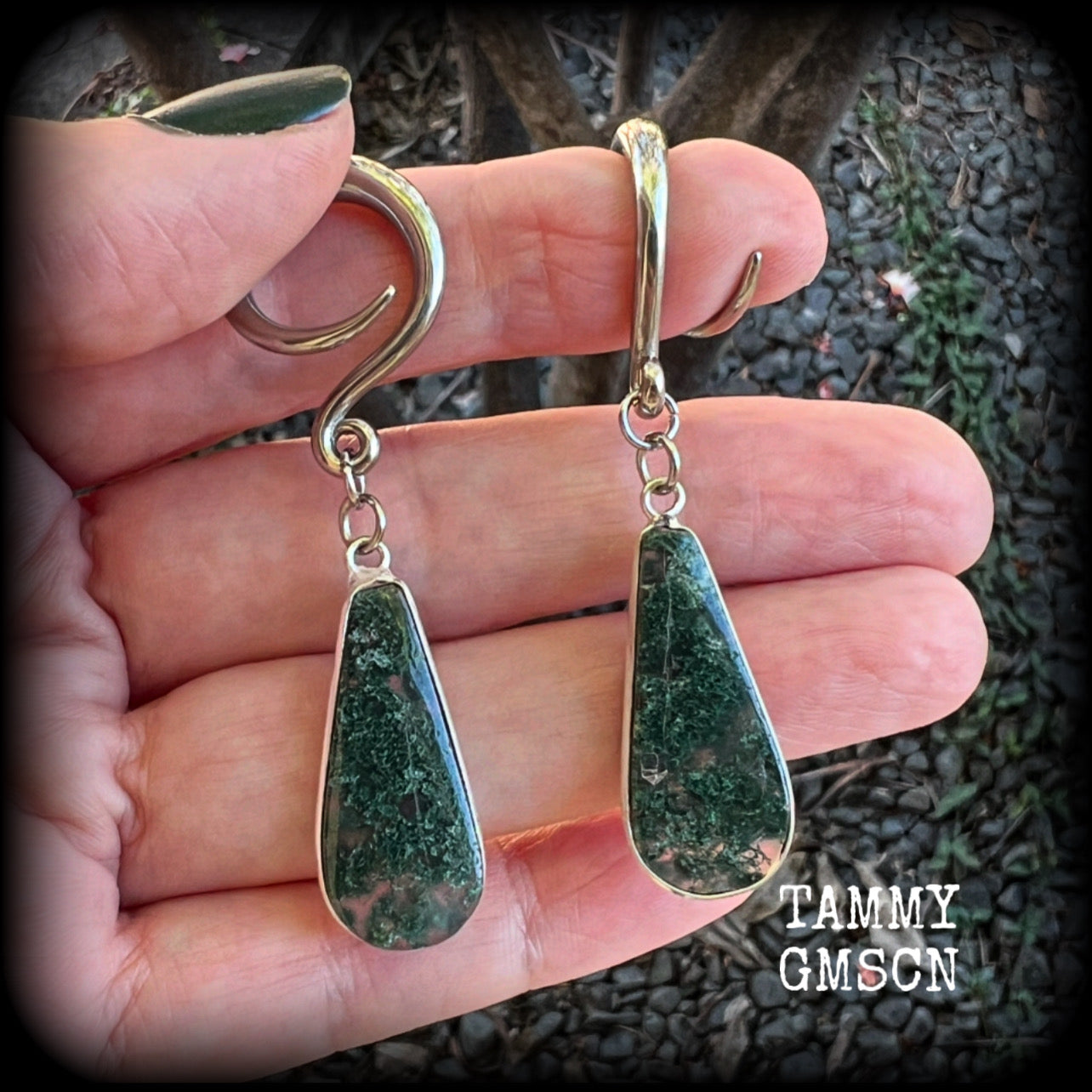 🔥 Moss agate is known to attract prosperity, balance emotions, and boost physical health and fertility 🔥

These unique gauged earrings feature gorgeous green moss agate teardrop gemstones, measure just over 6cms from tip to tip, and weigh approx 6 grams each.

This pair have been made with 6 gauge (4mm) surgical steel full curls, suitable for stretched lobes.